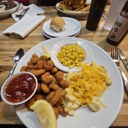 21 breaded shrimp. Sides: mac' n cheese and sweet corn 21 breaded shrimp. Sides: mac' n cheese and sweet corn