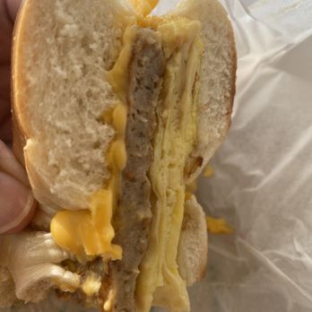 Brooklyn Bagel Bakery Deli - Sausage, egg and cheese on a plain bagel - Bagels Near Me - Johns Creek, Georgia