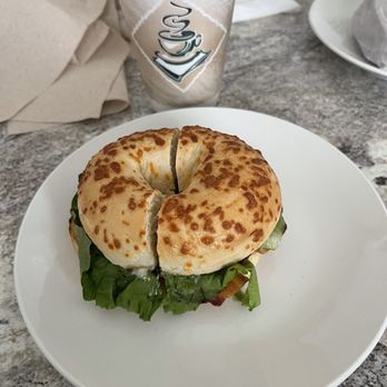 NY Bagel - a bagel sandwich on a white plate - Bagels Near Me - Houma, Louisiana NY Bagel - a bagel sandwich on a white plate - Bagels Near Me - Houma, Louisiana