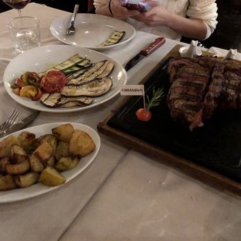 Trattoria dall'Oste - Bisteca Florentine with roasted potatoes and grilled vegetables. - Trattorie Near Me - Florence, FI Trattoria dall'Oste - Bisteca Florentine with roasted potatoes and grilled vegetables. - Trattorie Near Me - Florence, FI