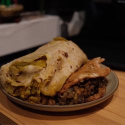 A&A Bake and Double and Roti Shop - Potato roti ($6) and veggie doubles ($3)