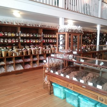 Sweet Palace - Chocolate bar and taffy wall in the background - Candy Stores Near Me - Philipsburg, Montana Sweet Palace - Chocolate bar and taffy wall in the background - Candy Stores Near Me - Philipsburg, Montana
