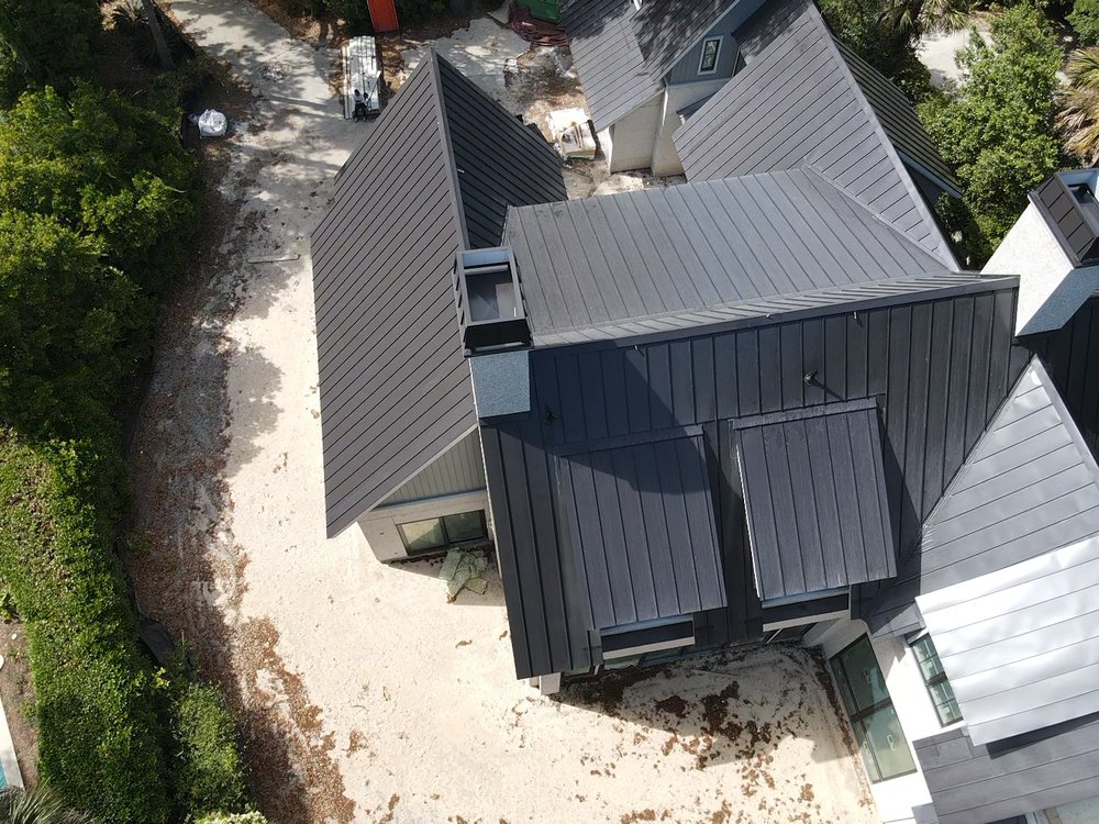 Slide of KMD Quality Roofing