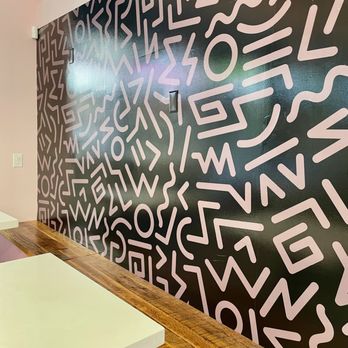 Chocolate Bash - a black and white wall with graffiti - Desserts Near Me - Phoenix, Arizona