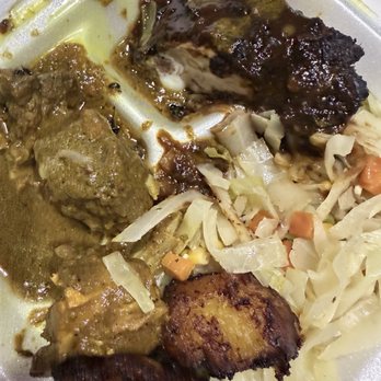 Caribbean Hut - Curry Goat & Chicken Combo ate some already - Caribbean Near Me - Gastonia, North Carolina