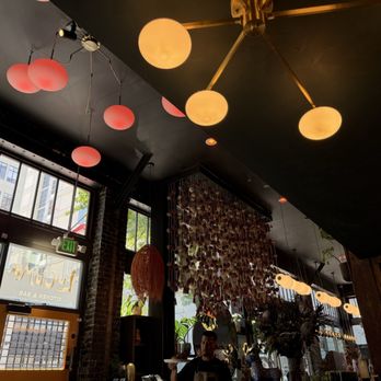 Lucuma Kitchen and Bar - Interior chandelier - Peruvian Near Me - Oakland, California Lucuma Kitchen and Bar - Interior chandelier - Peruvian Near Me - Oakland, California