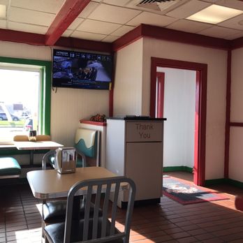 Abelardo's Mexican Fresh - a dining area with a table and chairs - Mexican Near Me - Ames, Iowa