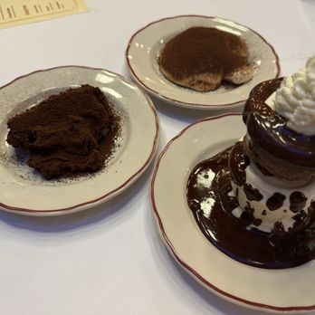 Entrecôte Restaurant - Three deserts Mouse au chocolat (left) Tiramisu (back) Le vacherin chocolate (right) - French Near Me - Vancouver, British Columbia Entrecôte Restaurant - Three deserts Mouse au chocolat (left) Tiramisu (back) Le vacherin chocolate (right) - French Near Me - Vancouver, British Columbia