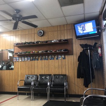 Luis' Corner Barber Shop - My son trying to stay still so he can get a hot wheel - Barbers Near Me - Austin, Texas