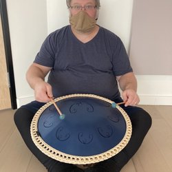 Lighthouse Community Yoga - A neighbor playing live drum in Saturday Morning Gentle Hatha!