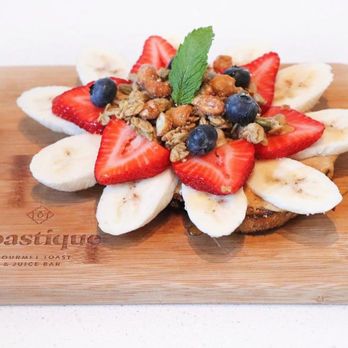 Toastique - sliced bananas, strawberries, and granola - Juice Bars & Smoothies Near Me - Washington, DC, District of Columbia Toastique - sliced bananas, strawberries, and granola - Juice Bars & Smoothies Near Me - Washington, DC, District of Columbia