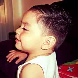Daniel's Haircut April 03, 2015. 2 on the sides & about an 1.5" trim on top.