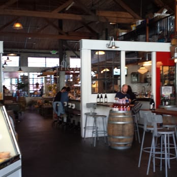Melrose Market - Meat market to the left; wine bar to the right. - Shopping Centers Near Me - Seattle, Washington