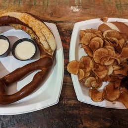 Crab stuffed pretzel with beer cheese sauce, and 3 sliders with house made chips. Divine!