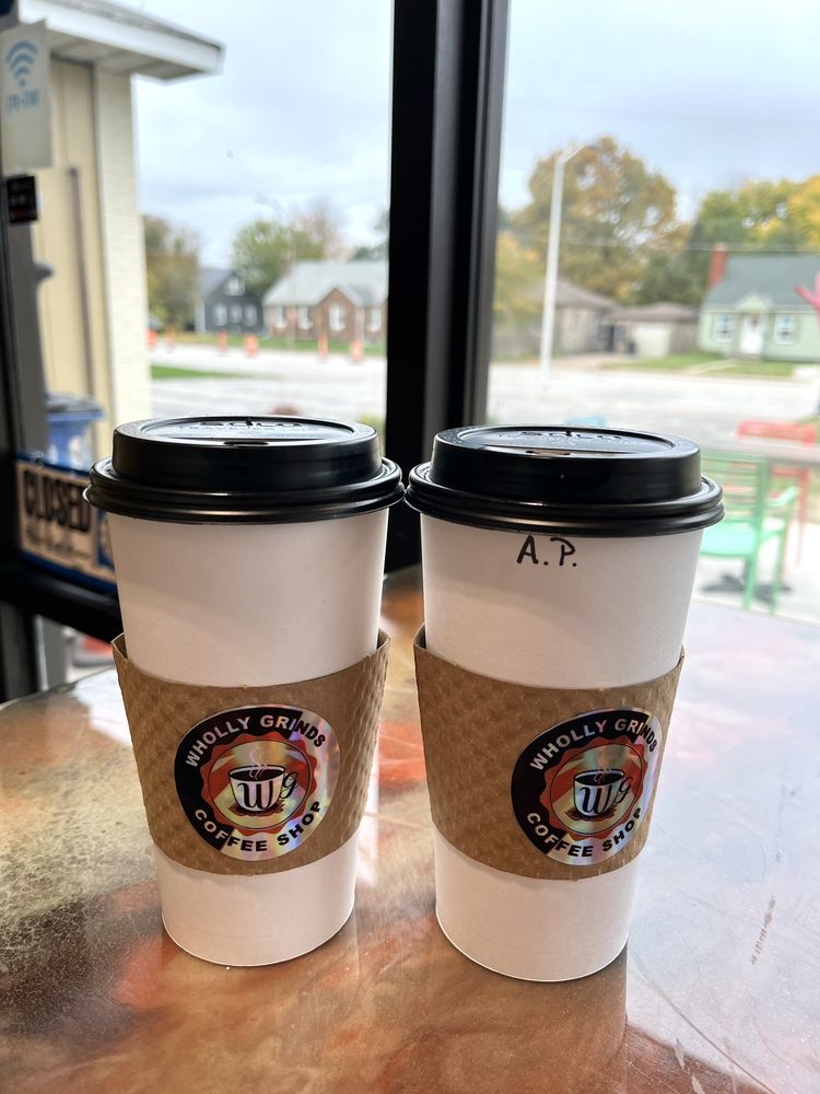 Wholly Grinds Coffee Logo