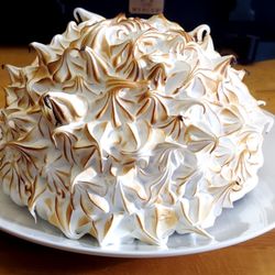 All The Pretty Flours - Baked Alaska with Lady Finger base, homemade chocolate ice cream and meringue, toasted to perfection.