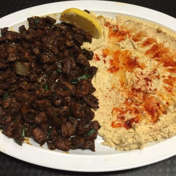 Aban Kitchen - a plate of food with a lemon wedge - Mediterranean Near Me - Carbondale, Illinois Aban Kitchen - a plate of food with a lemon wedge - Mediterranean Near Me - Carbondale, Illinois
