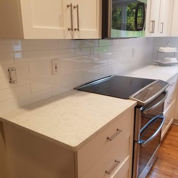 Upper Left Construction - a clean kitchen with white cabinets - General Contractors Near Me Upper Left Construction - a clean kitchen with white cabinets - General Contractors Near Me