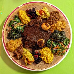 Lucy Ethiopian Restaurant - Veggie combo with doro wot in the middle. Yummy!