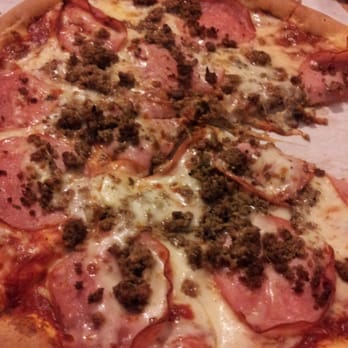 Big E Pizza - Canadian bacon & ground beef... Middle of the pizza is really doughy, pretty disappointing. - Pizza Near Me - Signal Hill, California
