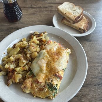 Pops Diner - Captain's Omelette- crab, shrimp, lemon dill sour cream, spinach, roasted red pepper, swiss, dusted with old bay - Diners Near Me - Chesapeake, Virginia Pops Diner - Captain's Omelette- crab, shrimp, lemon dill sour cream, spinach, roasted red pepper, swiss, dusted with old bay - Diners Near Me - Chesapeake, Virginia