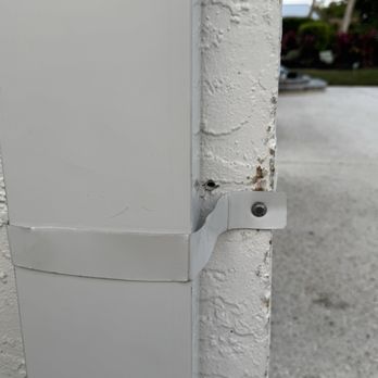 Gutter Professor - These are razor sharp metal straps that they do not know how to cut / install and can cut people & animals while walking around the house. - Gutter Services Near Me - Sarasota, Florida
