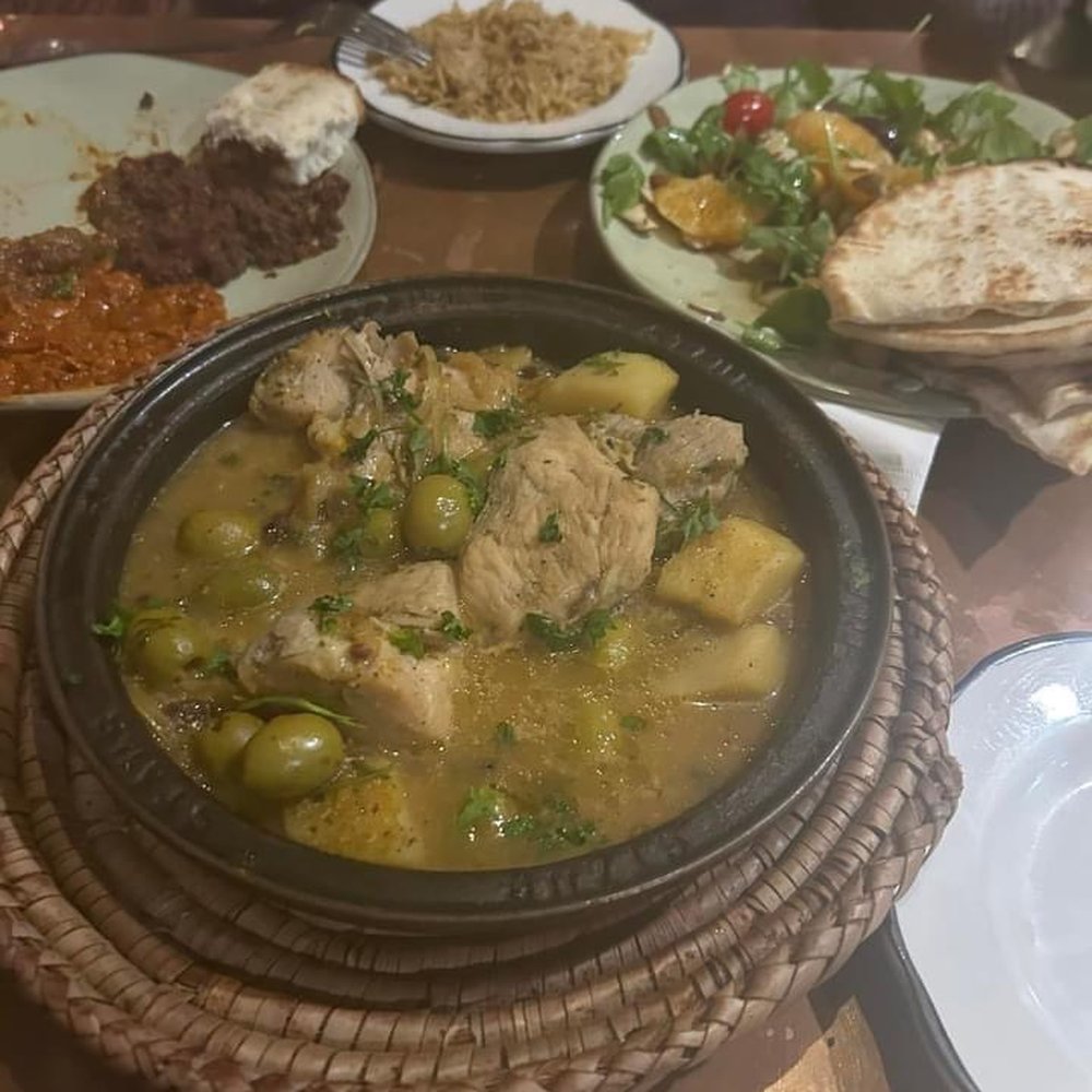 Chicken tagine with green olives. Assorted dips with pita. Wonderful refreshing salad. Chicken tagine with green olives. Assorted dips with pita. Wonderful refreshing salad.