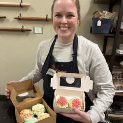 The Book Kitchen Cooking & Community - Holding my 6 cupcakes I decorated