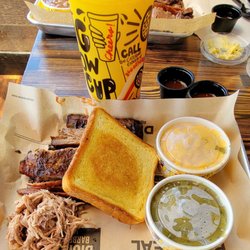 Dickey's Barbecue Pit - 3 meat platter: Texas Toast, pulled pork, polish kielbasa, 3 bone babyback ribs, mac-n-cheese, green beans, sweet iced tea.