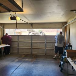 J Anthony Garage Doors - Installing panels