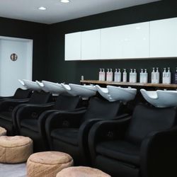 Volume Salon - Volume Salon Backbar and Shampoo Area Houston Webster Hair Salon