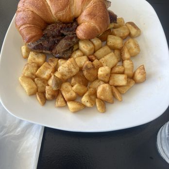 Linq Breakfast & Brunch Bar - Steak, egg, and cheese croissant which potatoes. - Breakfast & Brunch Near Me - Morrow, Georgia