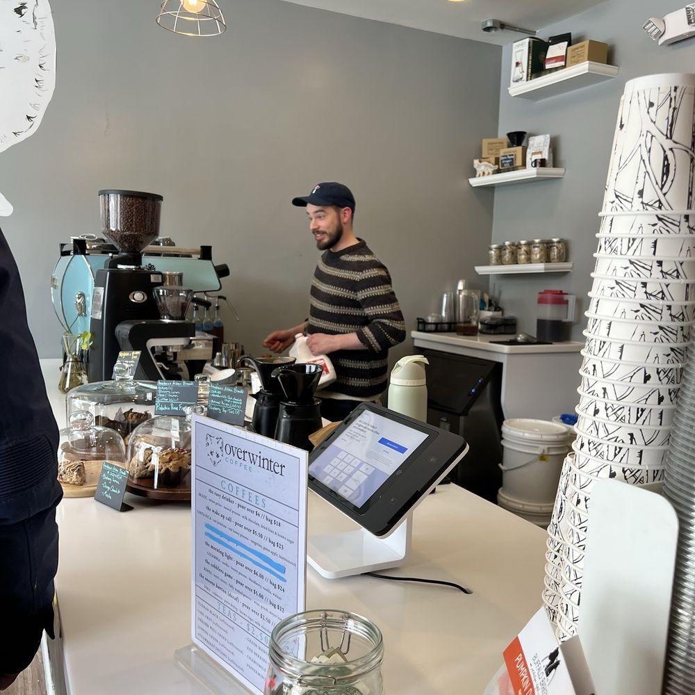 Proprietor prepping our espressos. Proprietor prepping our espressos.