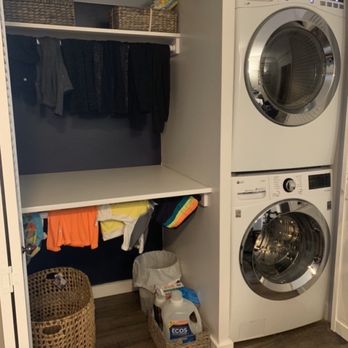 J Marvin Handyman - Our new and improved laundry space with plenty of room to hang and fold clothes, with some doors that slide everything closed. - Handyman Near Me