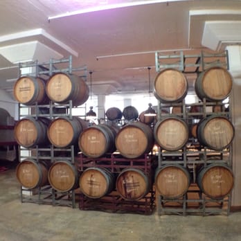 Urban Winery Sydney - Barrels of their wine stacked three high. - Wineries Near Me - Moore Park, NSW
