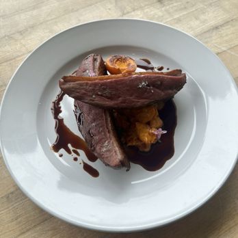 The Gourmandise School - The full size plated breast of duck with apricot chutney and duck jus. - Cooking Schools Near Me - Santa Monica, California
