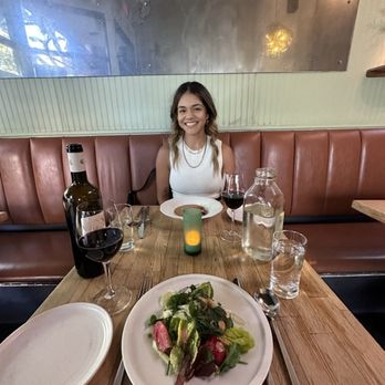 Mama - Starting salad with a bottle of wine. - Italian Near Me - Oakland, California Mama - Starting salad with a bottle of wine. - Italian Near Me - Oakland, California