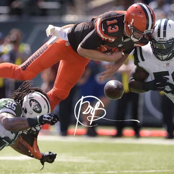 Peter R Barber Photography - Cleveland Brown quarterback Josh McCown fumbles the ball while being hit by New York Jets inside linebacker Demario Davis. - Event Photography Near Me - Schenectady, New York