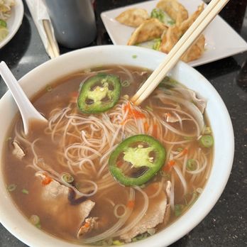 Pho 7 - a bowl of soup with chopsticks - Vietnamese Near Me - Thornton, Colorado