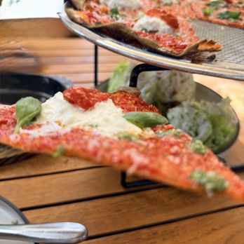Truly Pizza - Skinny margarita pizza is simple and crispy but rich in fresh flavors. - Pizza Near Me - Dana Point, California