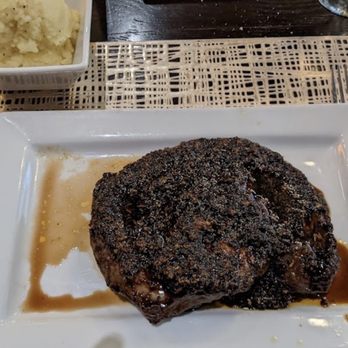 Serengeti - a steak on a plate with a side of mashed potatoes - Southern Near Me - Baltimore, Maryland Serengeti - a steak on a plate with a side of mashed potatoes - Southern Near Me - Baltimore, Maryland