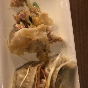 Peak Restaurant and Bar - Glass shard(top) on Chicken Momo - Sports Bars Near Me - Irving, Texas Peak Restaurant and Bar - Glass shard(top) on Chicken Momo - Sports Bars Near Me - Irving, Texas
