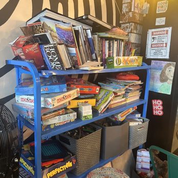 Churro Hub Cafe Plus - fun games + books - Desserts Near Me - Los Angeles, California