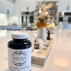 Joyful Roots - Placenta caps via Joyful Roots in their beautiful packaging!