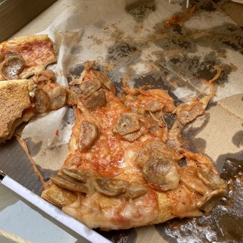 Crosby Pizza Stop - a half eaten pizza in a box - Pizza Near Me - Bronx, New York Crosby Pizza Stop - a half eaten pizza in a box - Pizza Near Me - Bronx, New York