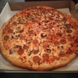 Julie's Pizzeria - Large sausage and mushroom pizza @ Julie's
