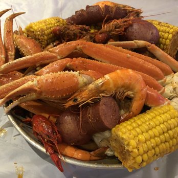 Crab Station - Deep Ellum - The Coral Sea: 1 lb crawfish, 1 lb shrimp, 1.25 lb snow crab, 2 corns, red potatoes & sausages ~ medium spicy - Seafood Near Me - Dallas, Texas
