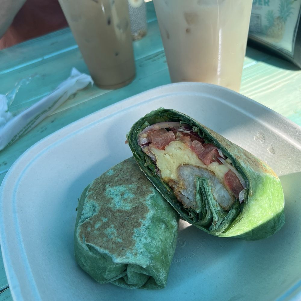 Seaside Eatery - Breakfast Wrap (eggs, tomato, red onion, spinach, hashbrown and a delicious sauce) - Food Trucks Near Me - Key Largo, Florida Seaside Eatery - Breakfast Wrap (eggs, tomato, red onion, spinach, hashbrown and a delicious sauce) - Food Trucks Near Me - Key Largo, Florida