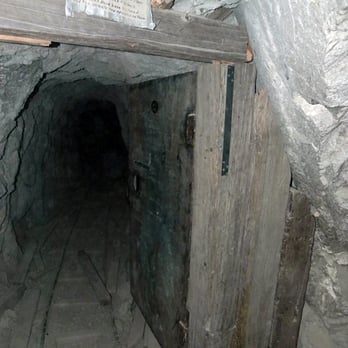 Burro Schmidt Tunnel - Entrance to a tunnel with mine cart rails - Hiking Near Me - Inyokern, California