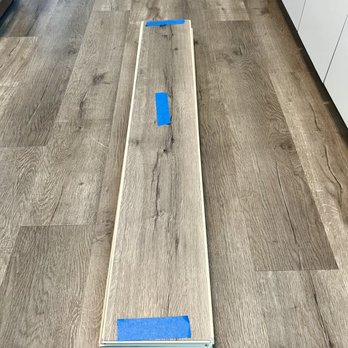 Flooring FX - The replacement plank was weighted down overnight, so the glue could set and the plank settle. - Flooring Near Me - Santa Rosa, California